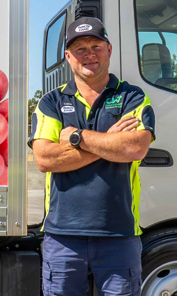 A fleet manager reviewing a fleet of vehicles